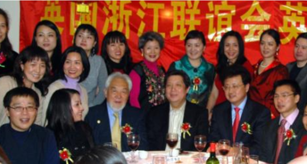 Figure 1: Lord Wei (front row, first from right), Chinese Embassy Counsellor for Overseas Chinese Affairs Zhao Kun (赵昆) (front row, third from right), President of the All-British Chinese and Overseas Chinese Association for the Promotion of China's Unification (全英华人华侨中国统一促进会) Dr. Shan Sheng (单声博士) (front row, fourth from right), President of the Zhejiang UK Association (英国浙江联谊会) Lady Xuelin Li Bates (李雪琳) (back row, third from right), Executive Vice-President of Zhejiang UK Association (英国浙江联谊会) Huang Ping (黄萍) (back row, second from right).